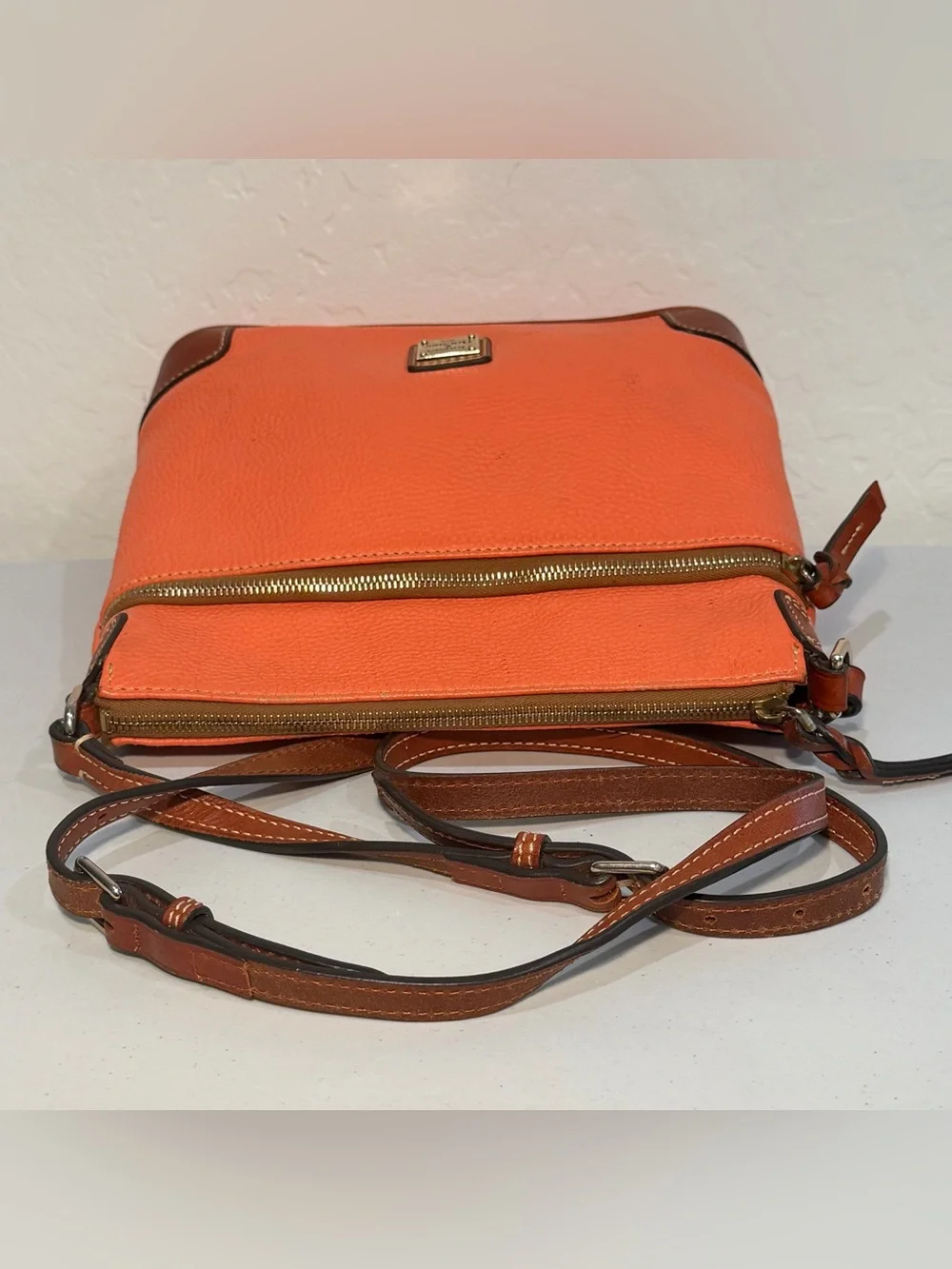 Dooney & Bourke scuffed corners